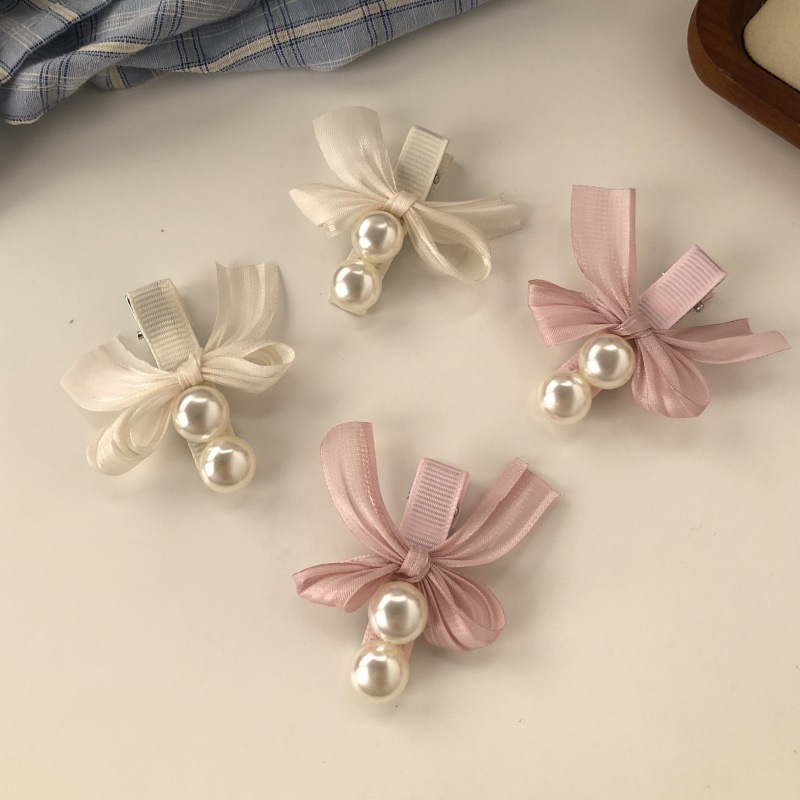 Fuchsia hairgrip with bow