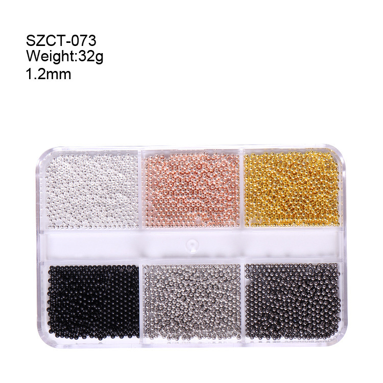 Accesorios de uñas transfronterizos al por mayor 6-grid nail aleación de acero cuentas oro plata tamaño mezclado decoraciones de uñas al por mayor