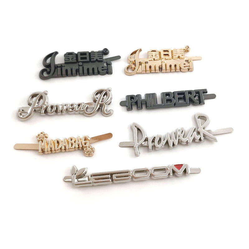 锌合金压铸行李箱包商标牌金属冲压家具铭牌手提包包五金字母插脚
