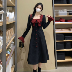 秋冬のフランスの大きいサイズの長袖のワンピースは腰を収めてやせています。