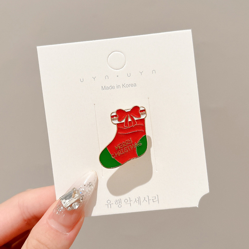 Broche de aleación de sentido avanzado japonés nueva insignia de personalidad de moda femenina de dibujos animados bolsa de Navidad accesorios de metal al por mayor