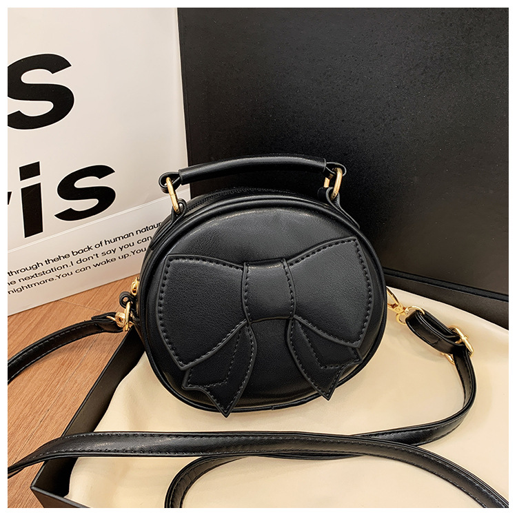 151g Weight Polyester Lining Material Zipper Closure Type Top Handle, Sling Strap Strap Type Crossbody Bag Bags Type Casual, Daily, Shopping Occasion Pu Leather Material Bow Knot Pattern All Seasons Season Girl'S Gender Cute Style Round Shape Girl'S Pu Leather Bow Knot Cute Round Zipper Crossbody Bag 16