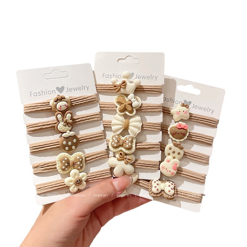 Cute anillo de cabello de color leche 2026 nuevo cabello de niños de alta elasticidad correa de goma duradera para niñas atadas cabello de cabello