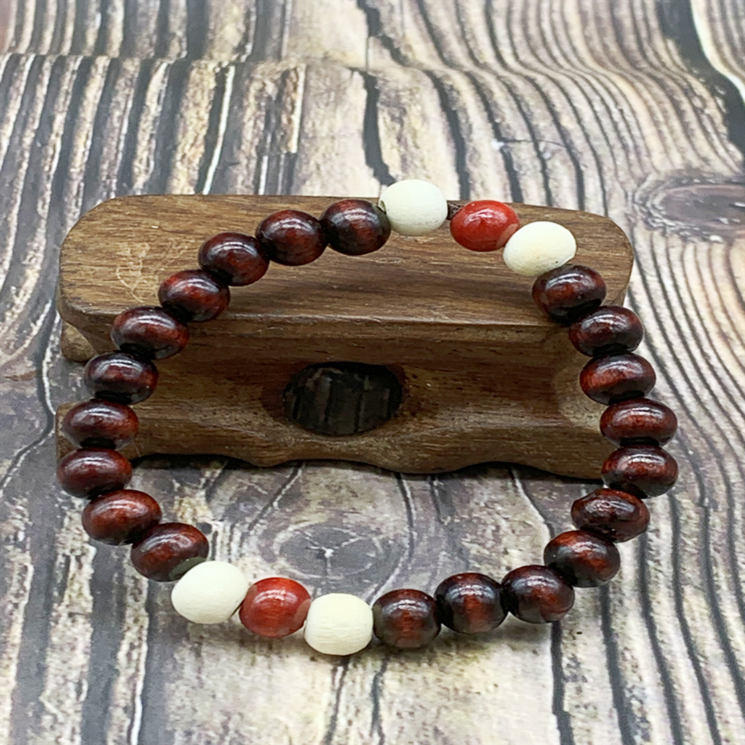 2 yuanes tienda puesto suministro 8MM sándalo solo anillo Buda cuentas pulsera Buda palabra cuentas de madera pulsera al por mayor