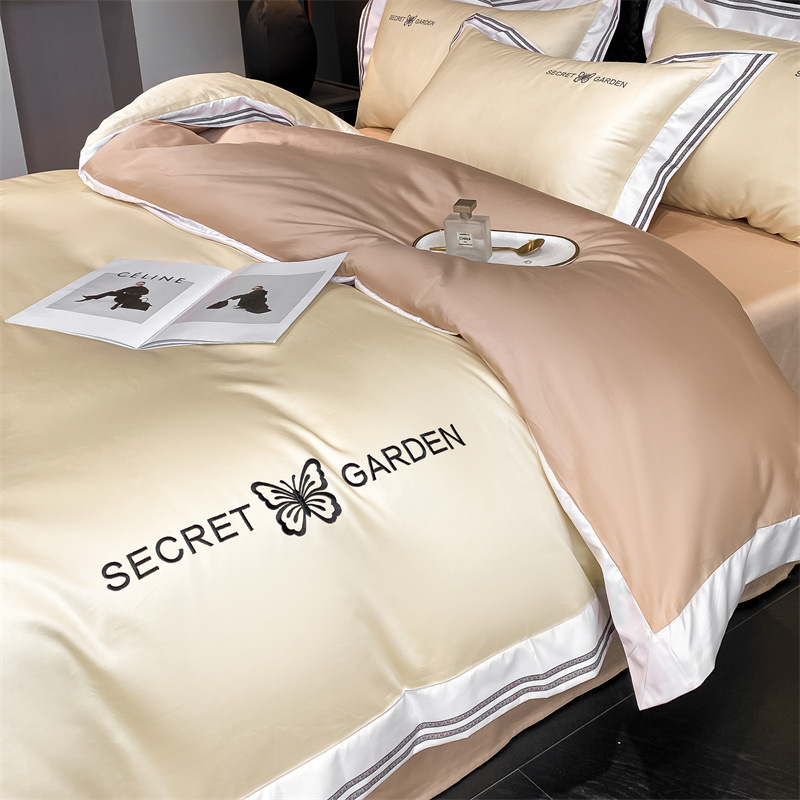 Simple ligero de lujo algodón puro cuatro piezas de sábanas de algodón ropa de cama textil doméstico cuatro estaciones tres piezas de conjunto general