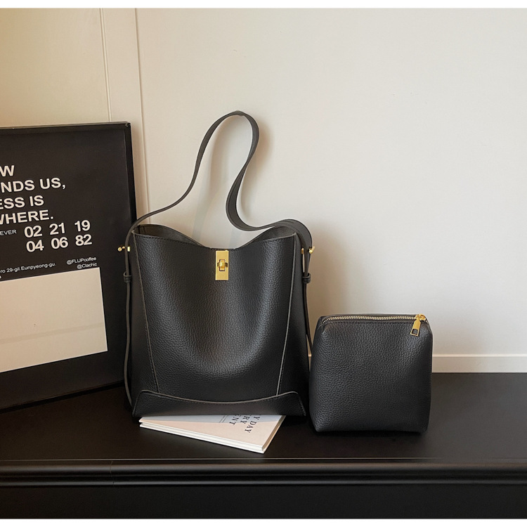 Bolso de mujer nicho sensación de alto nivel litchi estampado bolso de balde 2026 nuevo estilo de alta capacidad de moda bolso de hombro