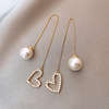 Sophisticated earrings heart-shaped from pearl, 2023 collection
