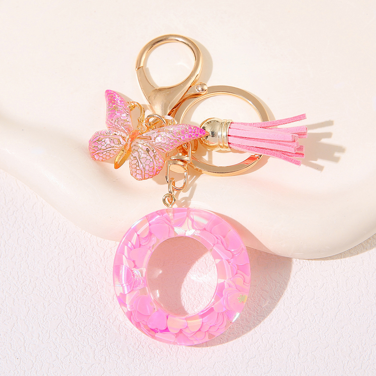 Nuevo rosa damas letras A-Z llavero de goteo de goma sequilla amor letras bordas mariposa llavero transfronterizo