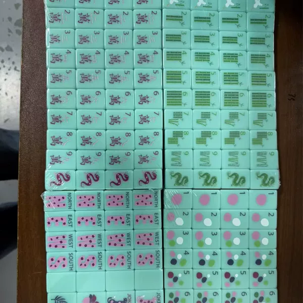 In stock: Tropical floral patterned mint green acrylic mahjong tiles, perfect for summer games and entertainment