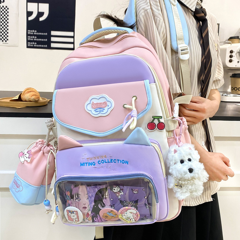 Mochila de tres piezas de estilo nuevo al por mayor para estudiantes de primaria y secundaria, mochila escolar de alto valor y gran capacidad, mochila de viaje de ocio simple