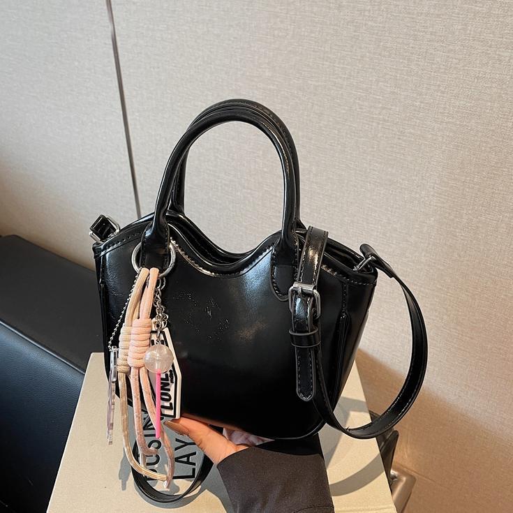 Bolso de tendencia extranjera, bolso de mano de mujer 2025, nuevo estilo de moda, bolso de cubo de hombro casual, mochila de textura de alta calidad