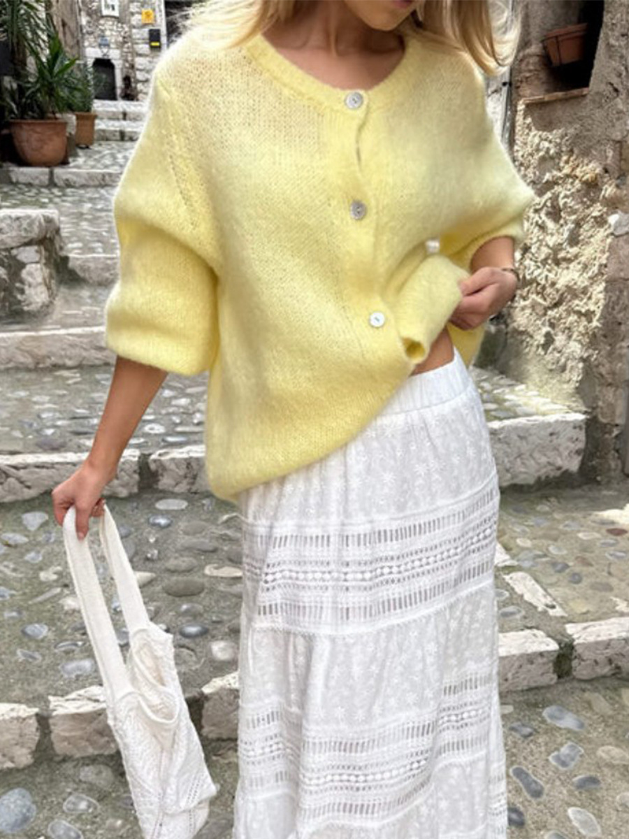 Cardigan de punto de color caramelo mujeres Europa y los Estados Unidos otoño y invierno 2025 cabello de cabello