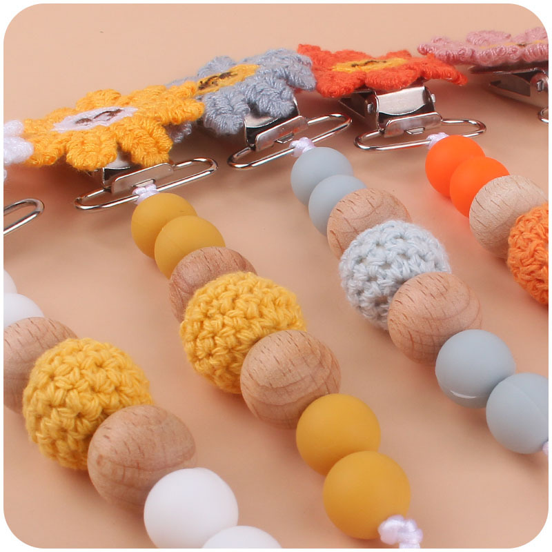 Nuevo bebé suministros de ganchillo girasol chupete clip bebé de silicona Beech cadena chupete cadena anti-caída Amazon
