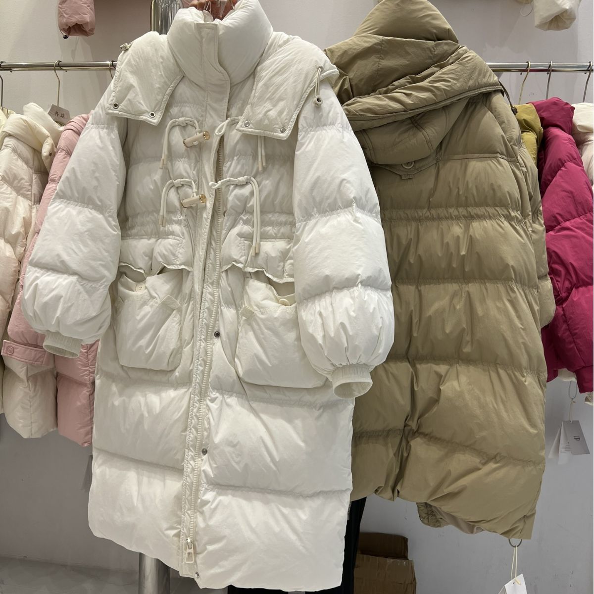 Winter clothing wholesale fashion over the knee loose thick horn buckle down jacket women's Korean version of loose waist thick warm tide