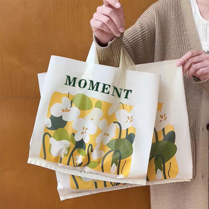 新款时尚服装手提袋网红服装店塑料袋高档手提式高颜值购物袋盯制