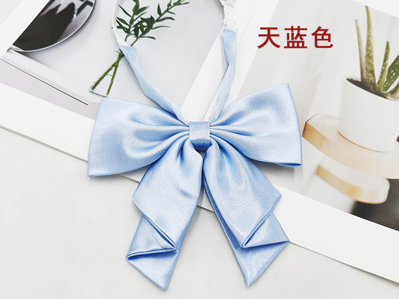 Spot al por mayor color sólido superficie brillante vino negro cuello rojo flor femenino estilo universitario nuevo estilo cola de golondrina plegable pajarita de raíz de pluma grande