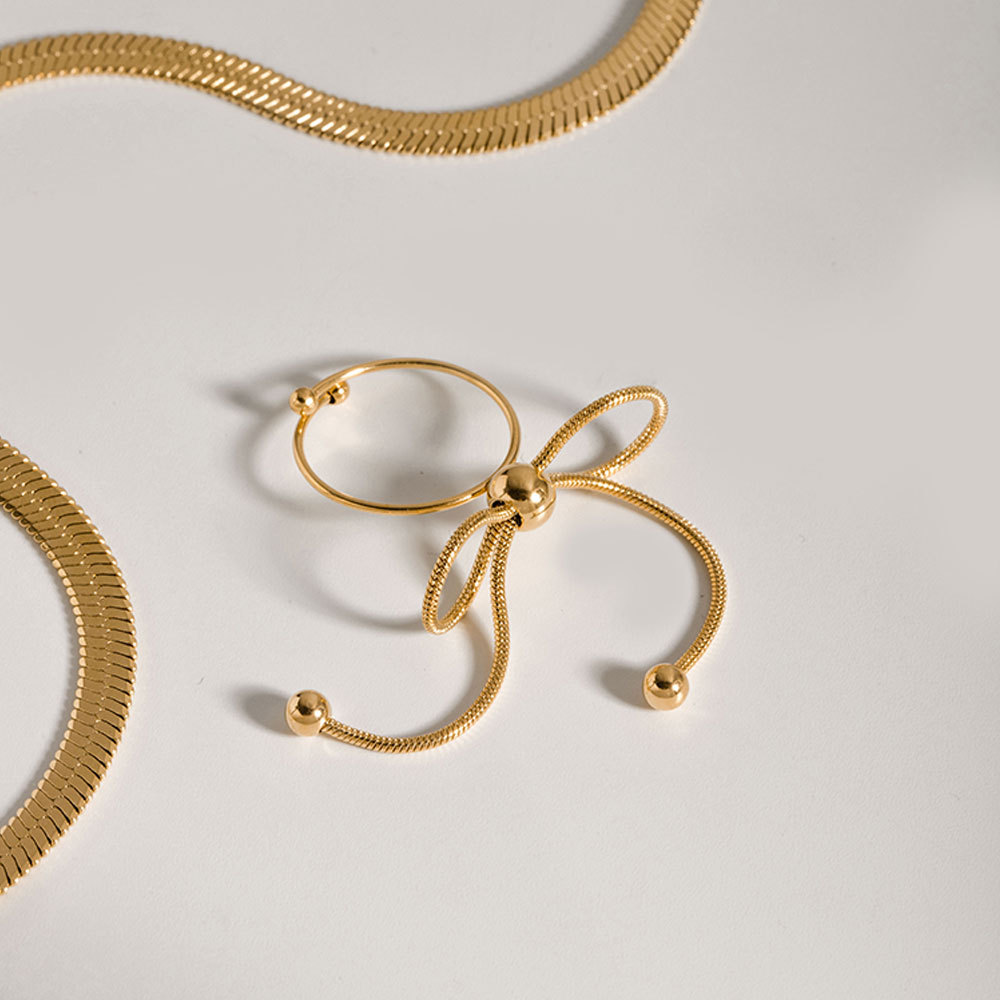 Title 6, Retro Bow Titanium Steel Ring, a stylish and du...