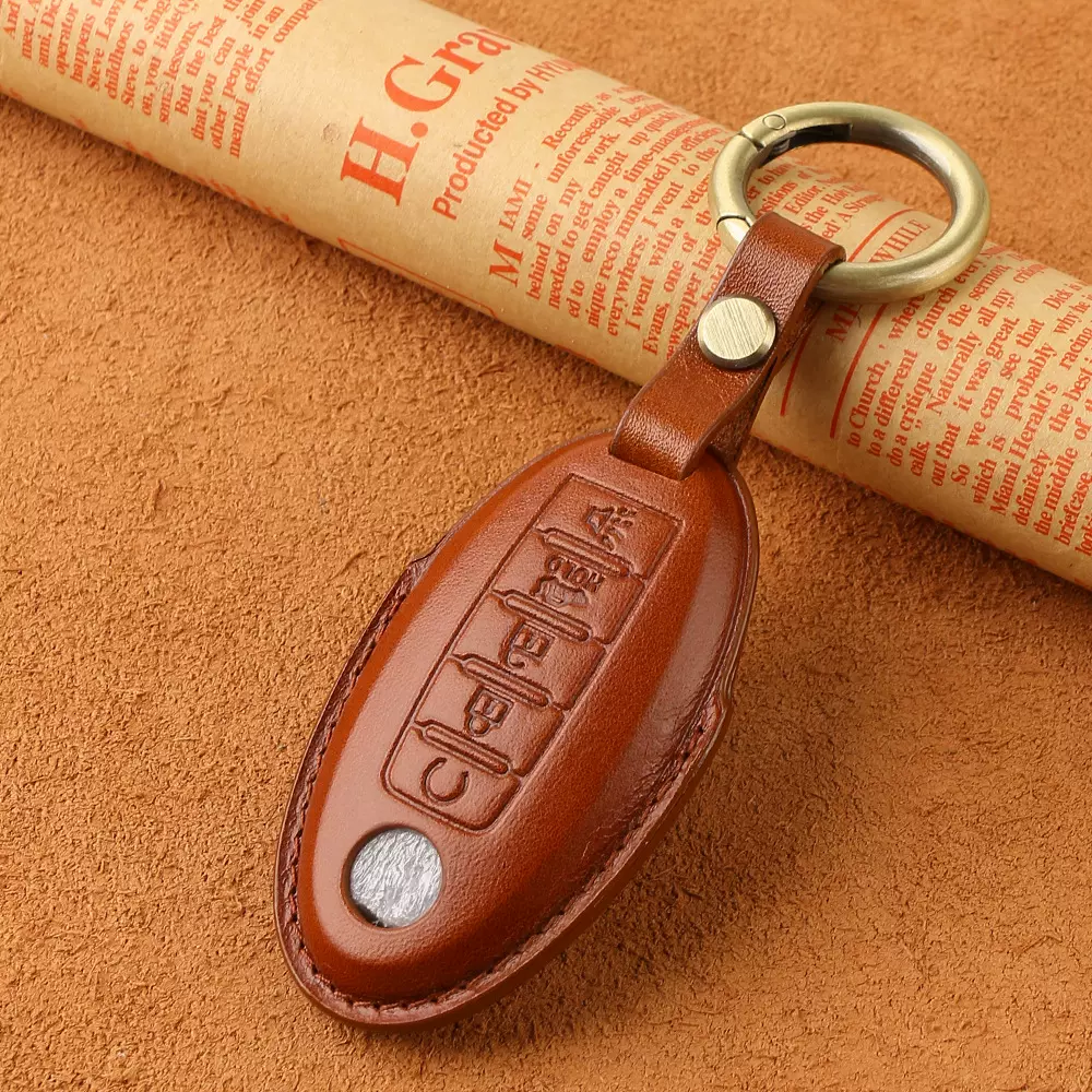 适用日产轩逸钥匙套真皮途乐Y62车扣智能5键牛皮钥匙包车载专用