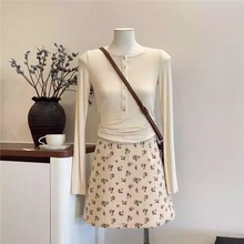 秋冬复古小碎花灯芯绒包臀短裙女设计感高腰A字气质半身裙