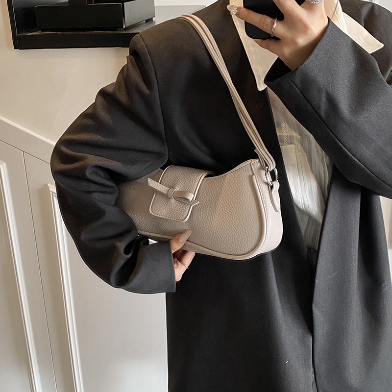 Versión coreana del bolso de axila de nicho 2025 primavera y verano nuevo bolso femenino lindo bolso de lazo bolso de hombro diario