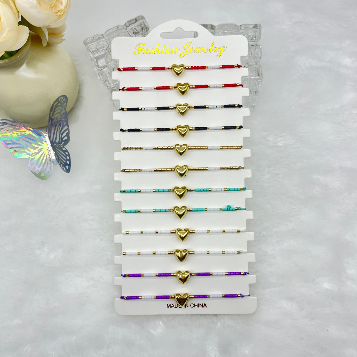 Cross-border new multi-color cartoon love rice beads hand-woven beaded hand rope lovers bracelet suit in stock wholesale