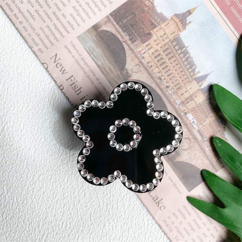 Adhesive extendable stand for phone case, with back attached the tabletop, airbags, and tabletop to support lazy people_voghion.com