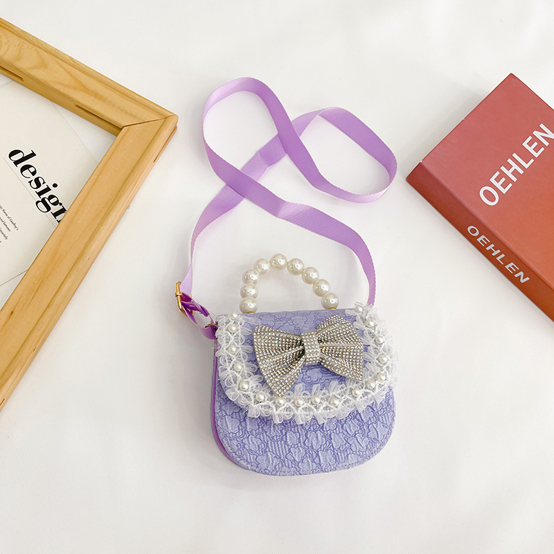 Bolsa de Niños de estilo coreano lindo arco perla Bolso pequeño princesa estilo occidental desgaste a juego joyería bolsa crossbody bolsa