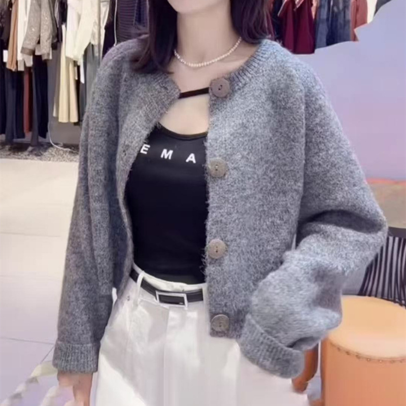 Retro de cuello redondo de punto para mujeres 2025 otoño y invierno nuevo estilo coreano camiseta de punto perezosa chaqueta suéter de color sólido chaqueta