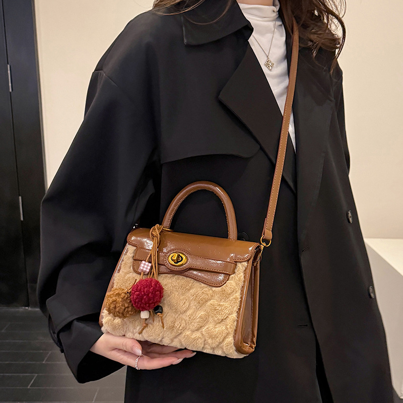 Otoño y invierno de alto nivel bolso de lana portátil para mujeres 2025 nuevo nicho Zhong commuting bolso de hombro bolso casual Kelly