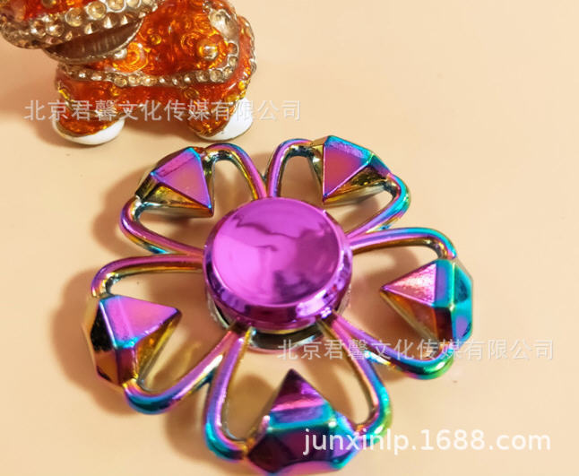 B Dedos de araña de colores, peonza, yema del dedo de metal de tres hojas, peonza de dos hojas, productos pequeños, suministro al por mayor