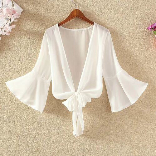 A light and breezy summer tank top dress with a small shoulder shawl, paired with an open front cardigan for added warmth and breathability, perfect for sunny days.