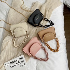 韓国のミニゼリーバッグ女性の新型アクリルチェーンの斜めショルダーバッグが流行しています。