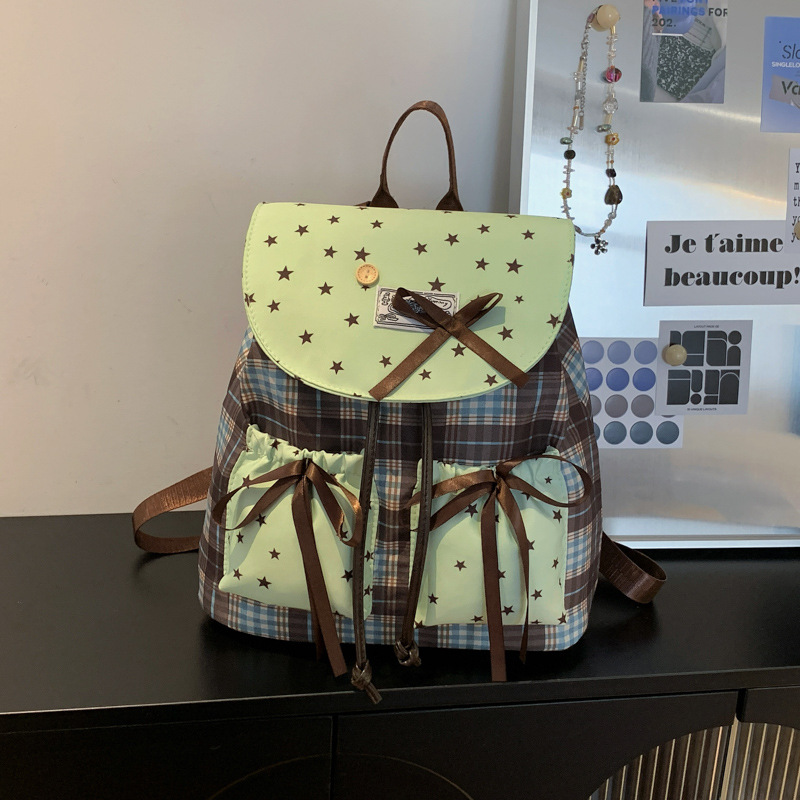 Mochila de estilo universitario de mujer nicho mochila 2026 nueva mochila simple a cuadrillas de viaje bolsa de estilo británico de mujer