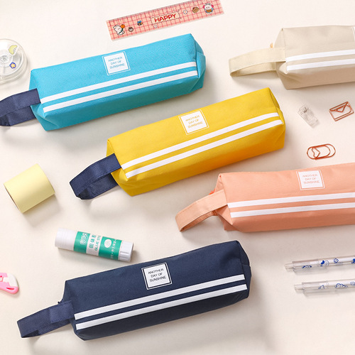 Japanese simple large-capacity pencil bag wholesale student portable pencil bag creative solid color Oxford cloth pencil bag