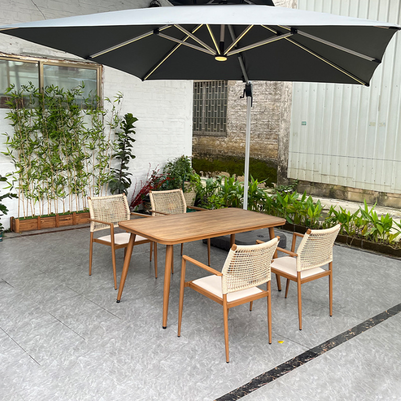 Fábrica directa de alta gama mesa y sillas de caña de escritorio HPL patio villa clubhouse hotel mesa y sillas de caña de caña