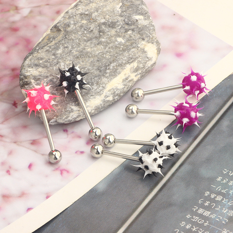 Silver pointed spike labret stud material detail