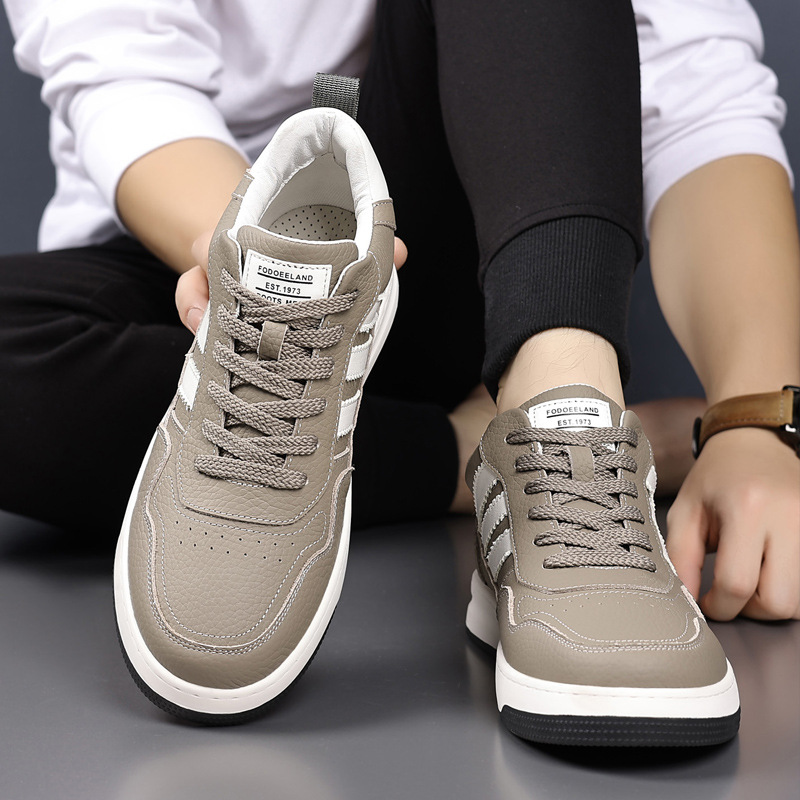 Invierno de cuero de vaca nuevo alto algodón zapatos de hombre zapatos deportivos casuales de cuero más terciopelo calentamiento zapatos de hombre