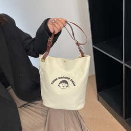 南风联名款梦想家水桶包包上班族单肩斜挎帆布包笑脸小众女包百搭