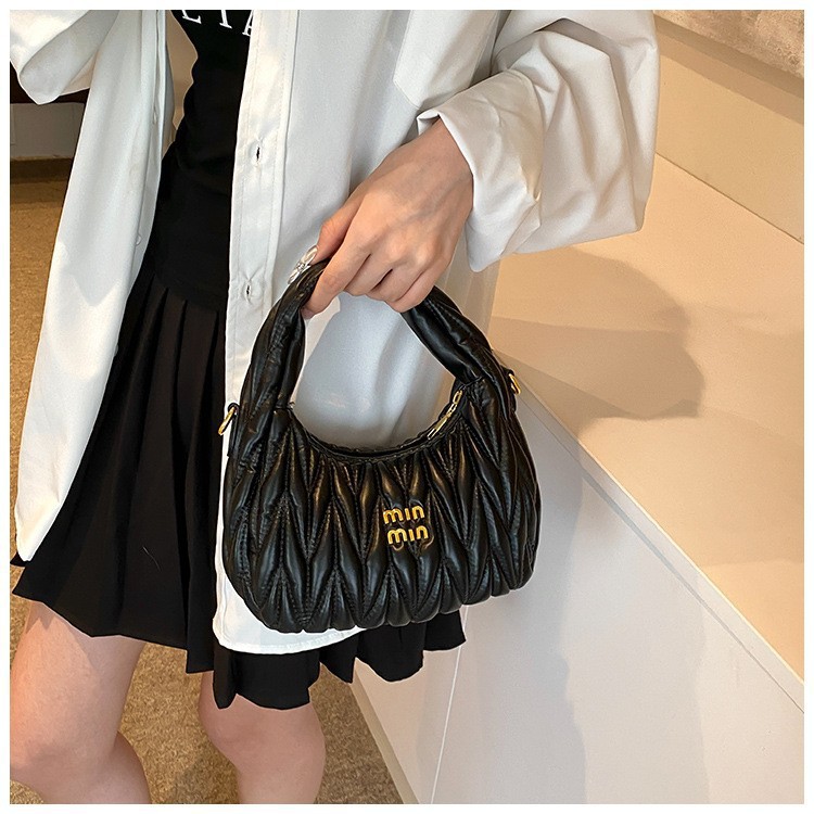 Bolsos de todo fósforo 2024 moda de verano textura plisada bolsa de axilas bolso retro ins bolso femenino de moda simple