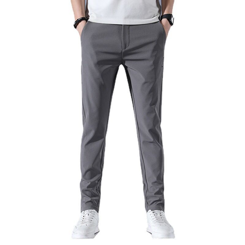 2023 pantalones casuales para hombres primavera y verano estilo coreano estiramiento de moda Pantalones slim fit pies de seda de hielo cintura elástica pantalones de color sólido para hombres