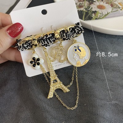 新型の美しいレトロな合金の潮の風はドリルのフリンジバッジの鉄塔の女性の優雅なブローチを入れてアクセサリーの卸売りを配合します。