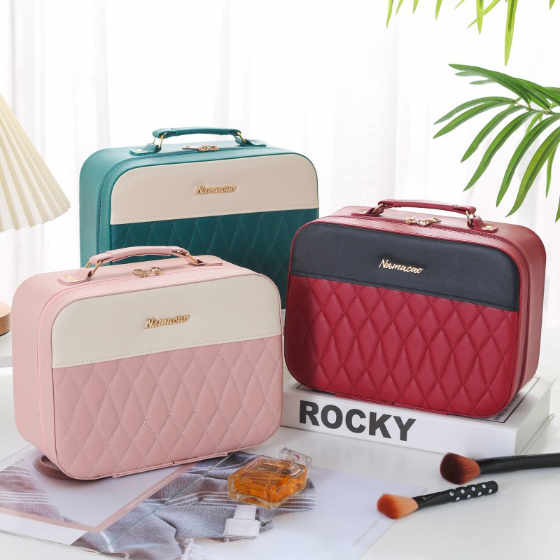 Two-color handheld cartoon cosmetic bag for traveling