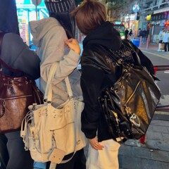 韓国の小衆Deinet機関車は25年の新型の特包の大きいサイズの縄のポケットのリベットのショルダーバッグの女性を包みます。
