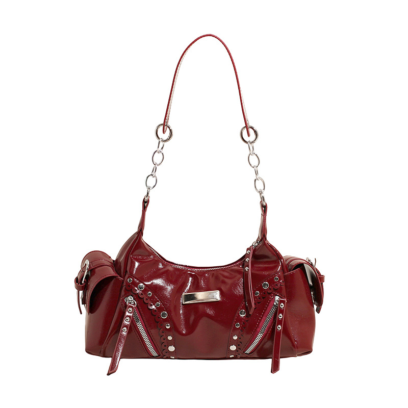 Bolso de axila de textura de alta calidad 2025 verano nuevo bolso femenino personalizado bolso de remache retro bolso de hombro de gran capacidad