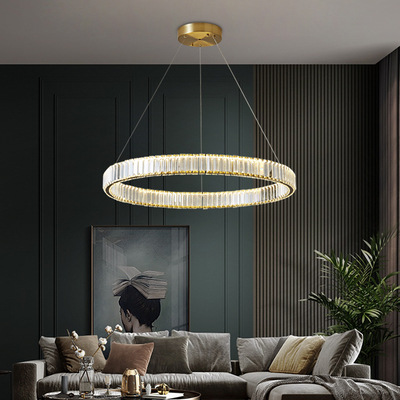 Postmodern stainless steel circular crystal chandelier: elegant American-style living room fixture, minimalist design for bedrooms, and a chic, budget-friendly addition to dining rooms.