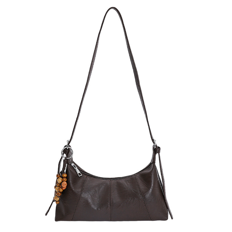 Bolsa de brazo retro transfronteriza para mujeres otoño y invierno 2025, nueva moda de nicho popular, bolsa de hombro universal, bolsa de transporte