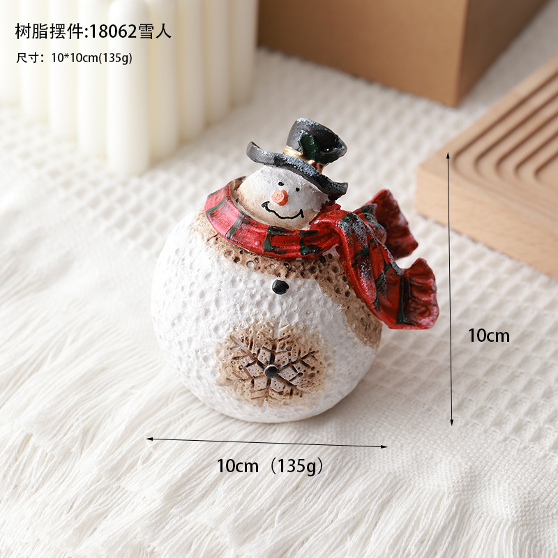 Buscando madera transfronteriza nueva decoración navideña resina muñeco de nieve decoración de escritorio retro micro paisaje diseño de props