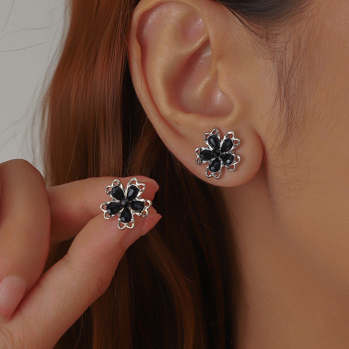 Sophisticated small black universal earrings with zircon