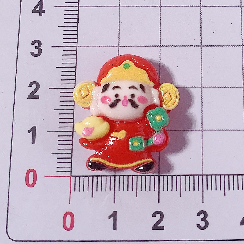 Año Nuevo dibujos animados dios de la fortuna Yuanbao accesorios de resina agujero zapatos caja de teléfono celular crema pegamento DIY automóvil control central dios de la fortuna