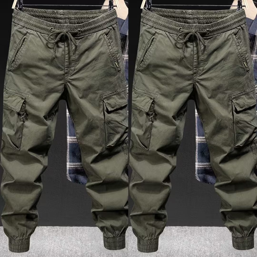 Ejército verde overoles hombres primavera y otoño marca de moda suelta tobillo-atado montañismo al aire libre pantalones tácticos hombres pantalones casuales americanos